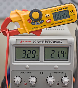 Disagreement between clamp-meter and power-supply